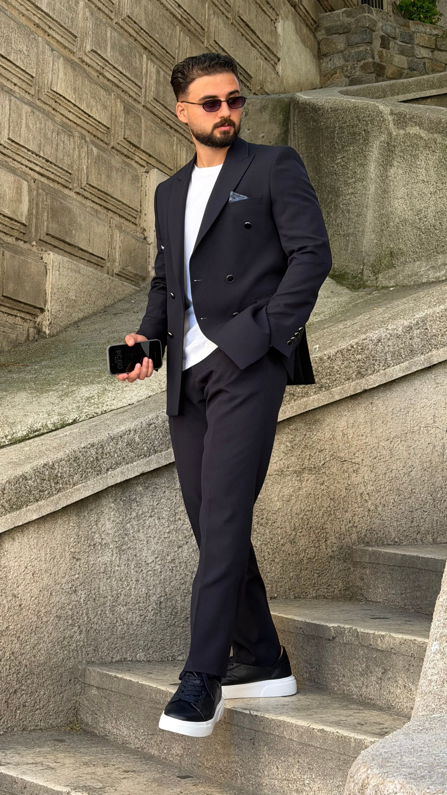 Navy slim fit suit showing structured lapel and chest pocket