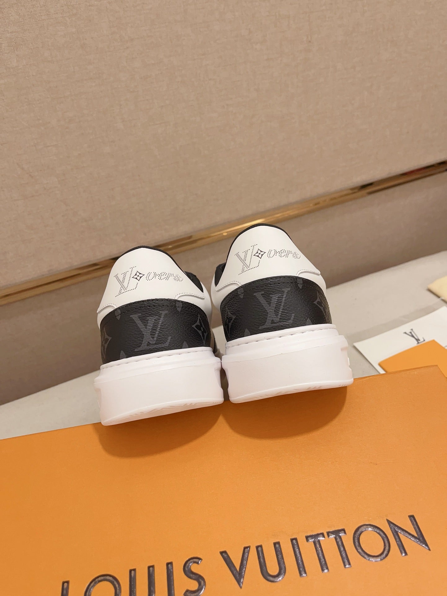 Louis Vuitton LVovers black and white Monogram low-top sneakers heel view