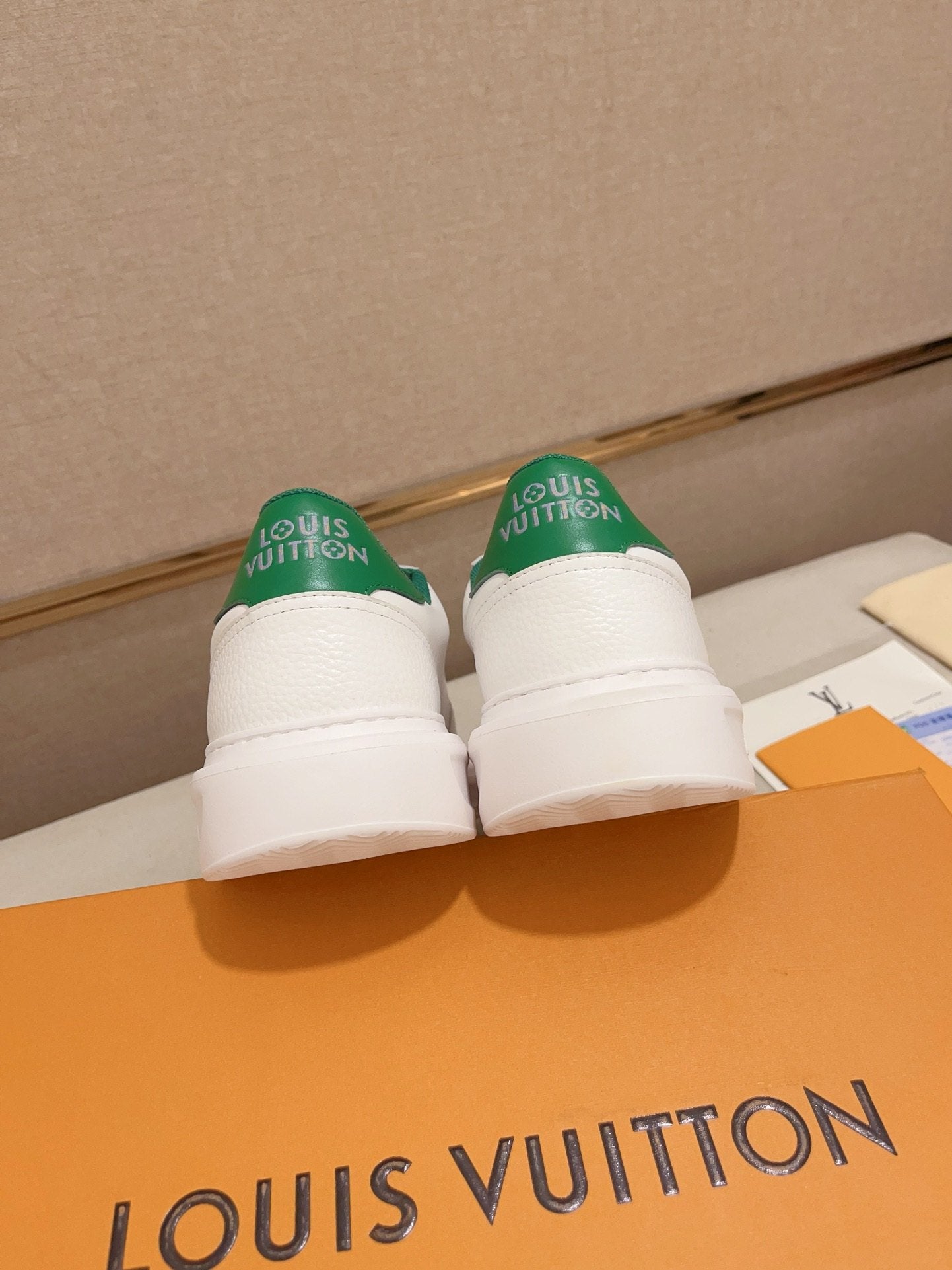 Louis Vuitton white and green logo low-top sneakers rear heel view