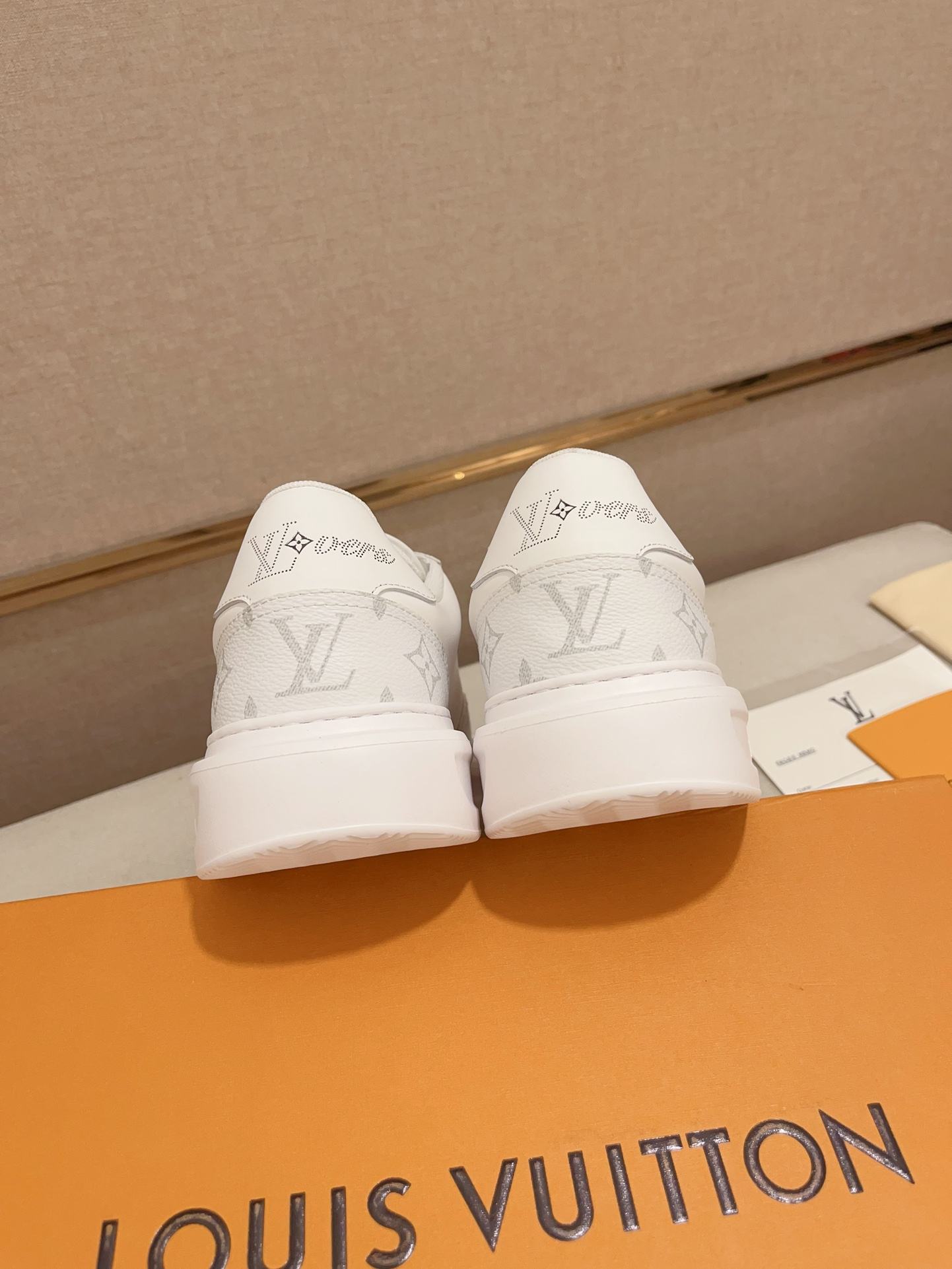 Louis Vuitton white and grey Monogram low-top sneakers rear heel view