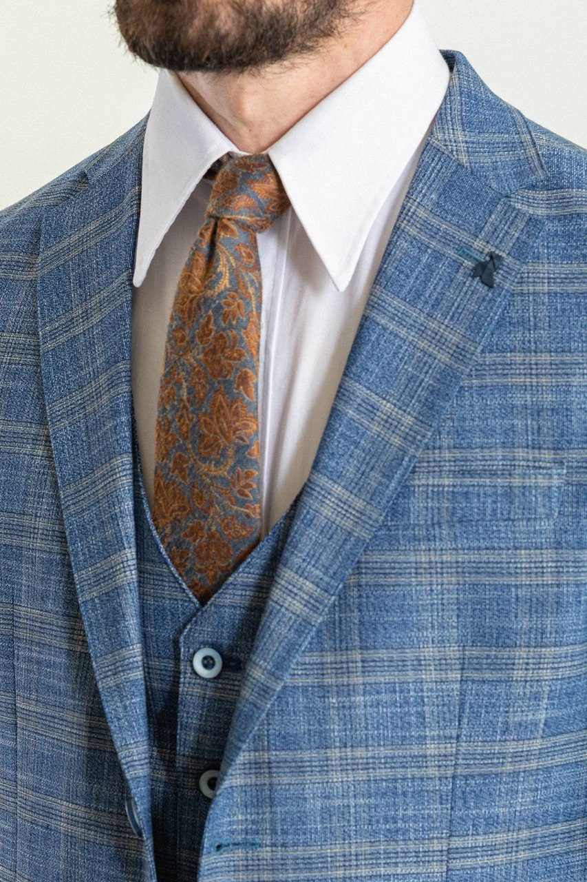 Man wearing an Azure Plaid 3-Piece Suit with a notched collar, flap pockets, and a slim fit, perfect for weddings and business meetings.