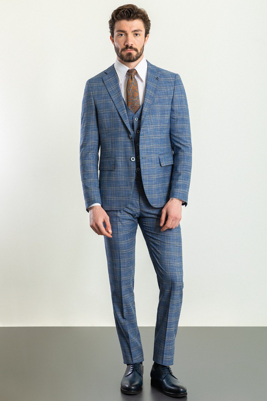 Man wearing an Azure Plaid 3-Piece Suit with a notched collar, flap pockets, and a slim fit, perfect for weddings and business meetings.