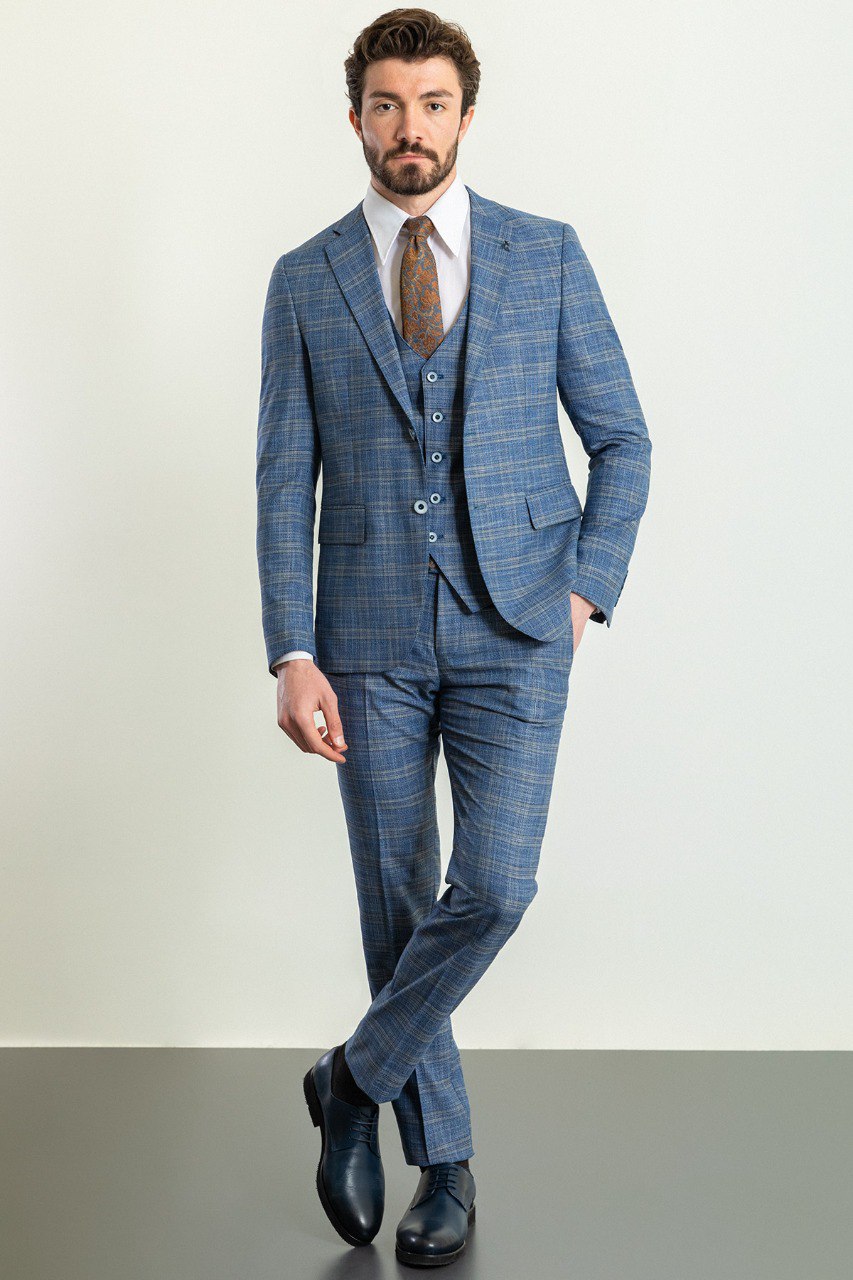 Man wearing an Azure Plaid 3-Piece Suit with a notched collar, flap pockets, and a slim fit, perfect for weddings and business meetings.