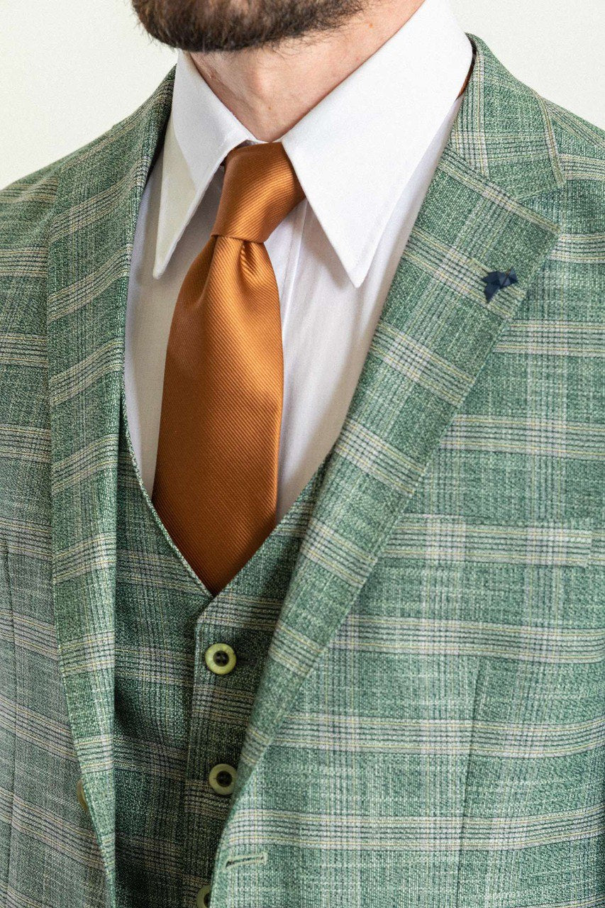 Man wearing an Emerald Check 3-Piece Suit with a notched collar, flap pockets, and slim fit, perfect for weddings and formal occasions.