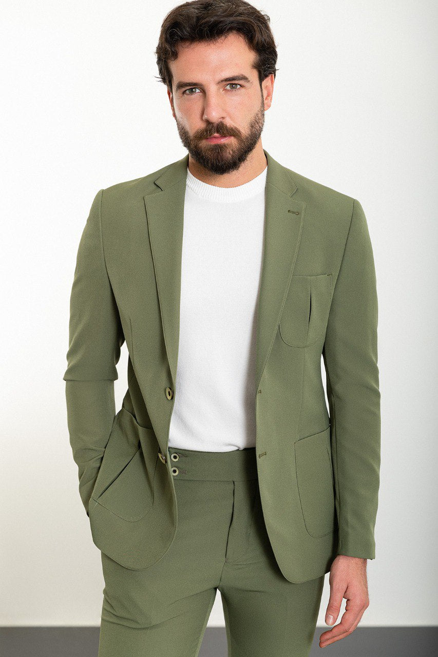 Man wearing the Urban Adventurer Khaki Suit, a slim fit khaki suit with extra pockets, ideal for casual and semi-formal occasions.