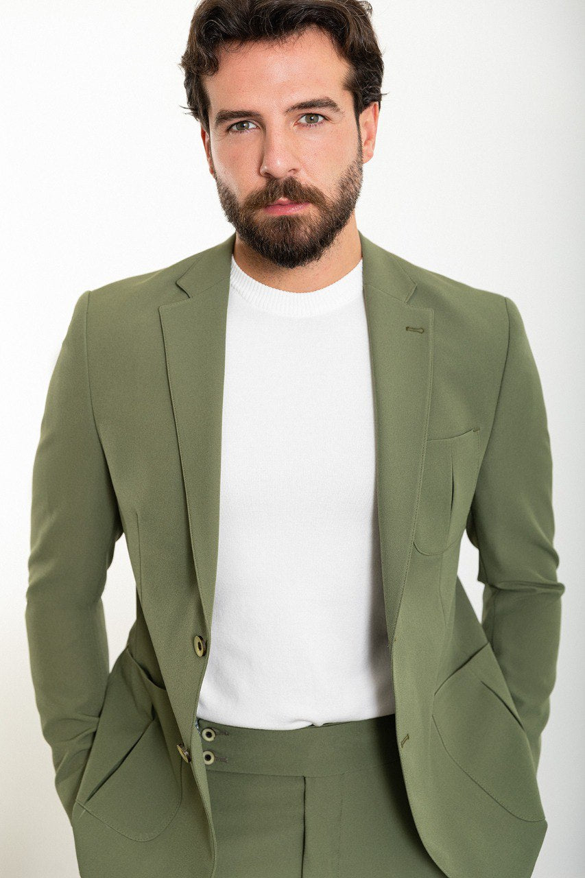 Man wearing the Urban Adventurer Khaki Suit, a slim fit khaki suit with extra pockets, ideal for casual and semi-formal occasions.