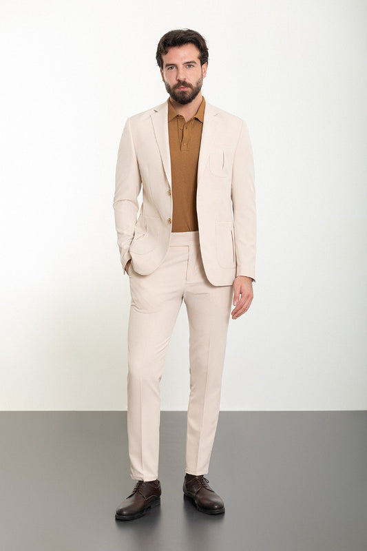 Man wearing the Urban Elegance Beige Suit, a slim fit beige suit with extra pockets, suitable for casual and semi-formal occasions.