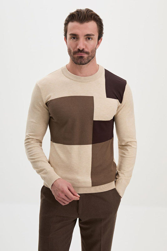 Front view of a man wearing a beige colour-block crew neck sweater