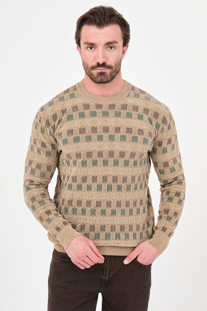 Front view of a man wearing a beige geometric knit crew neck sweater