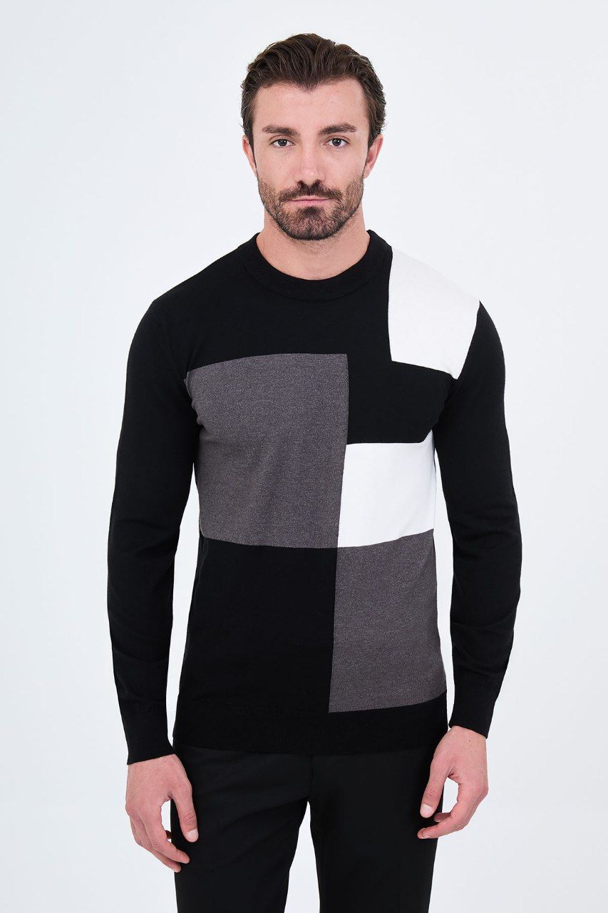 Front view of a man wearing a black colour-block crew neck sweater