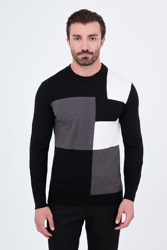 Front view of a man wearing a black colour-block crew neck sweater