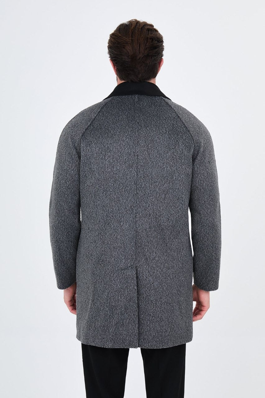 Men’s black wool-blend overcoat with a contrast collar, back view