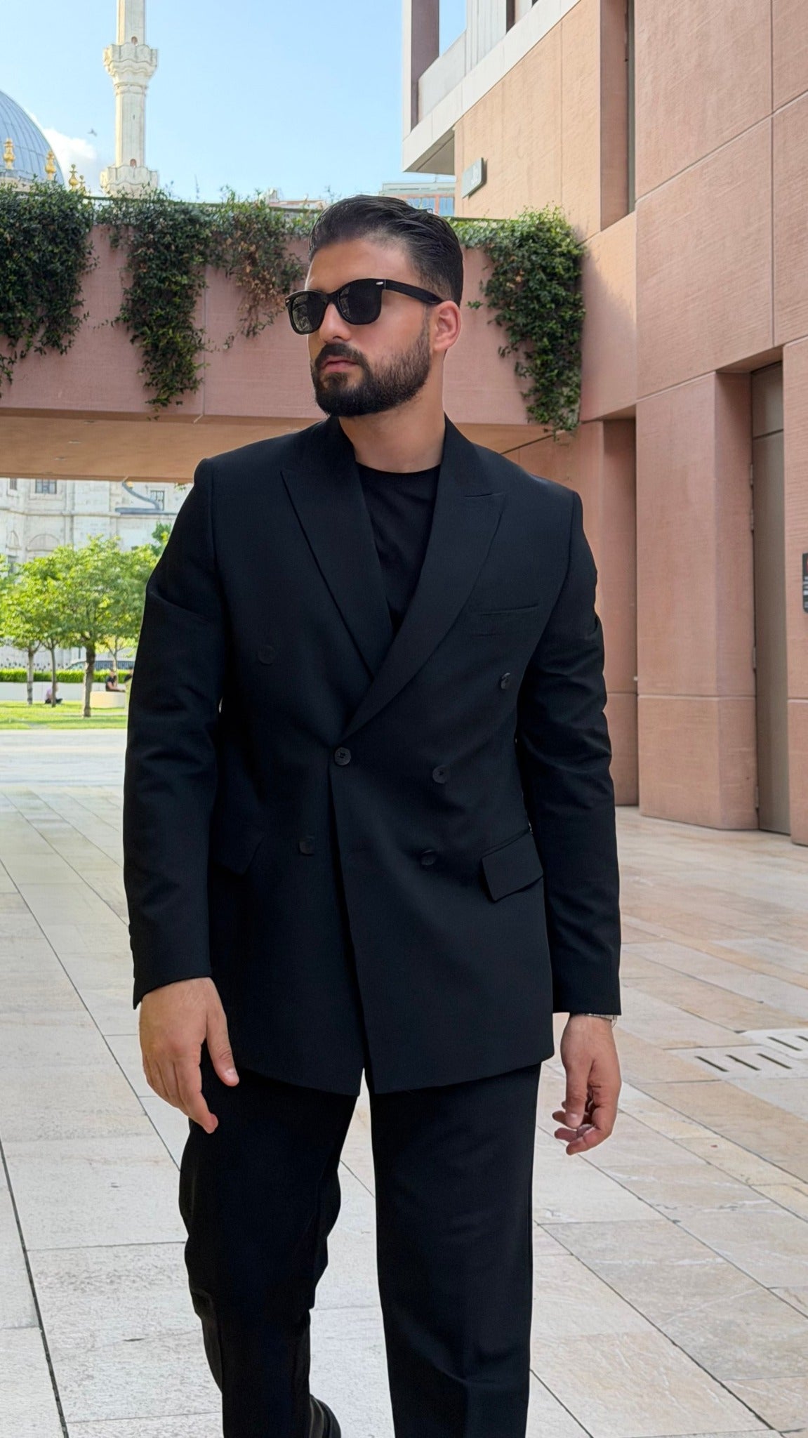 Men's black double-breasted two-piece suit front view