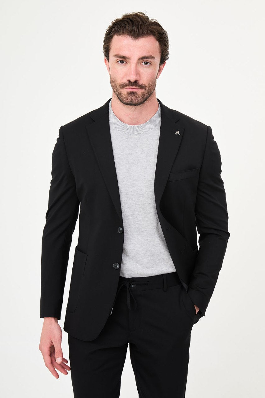 Men's black two-piece suit front styled view