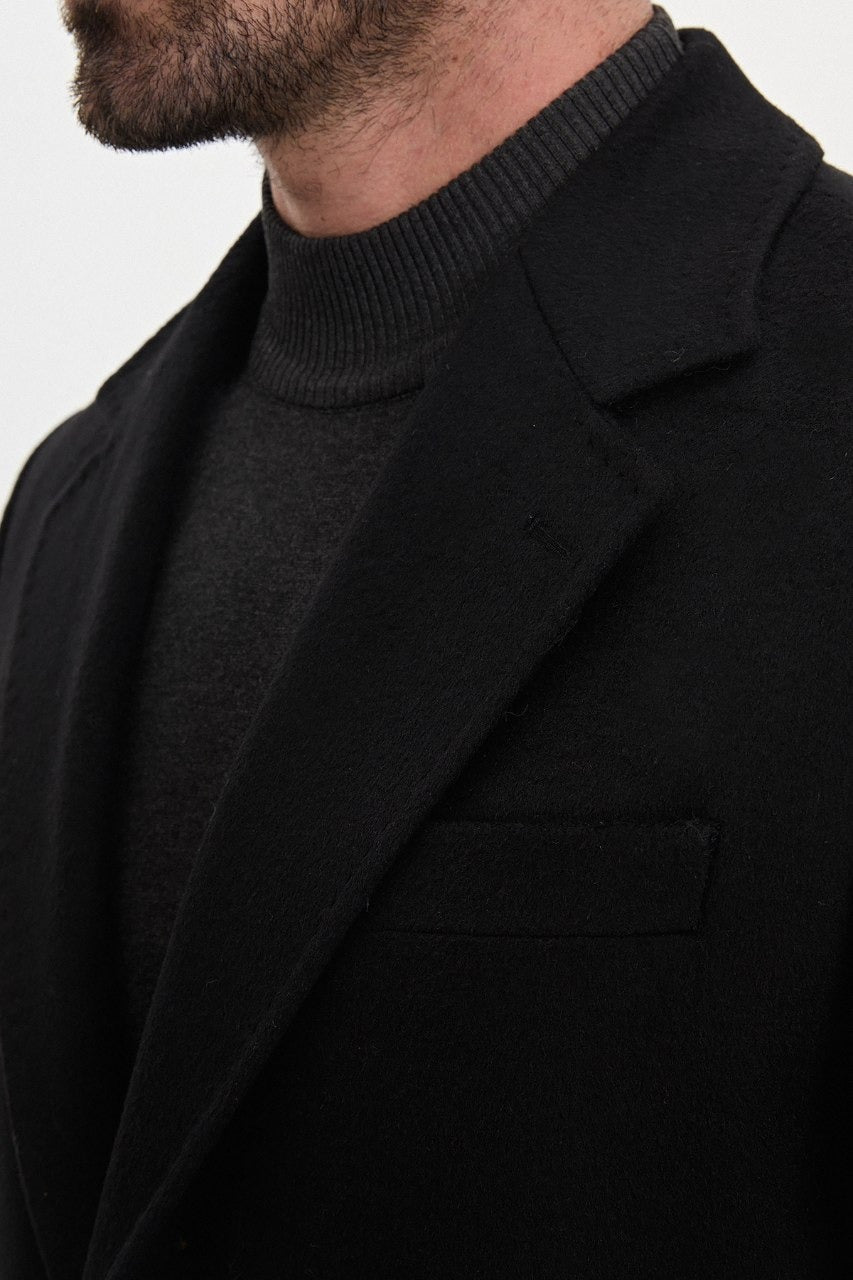Men’s black wool-blend overcoat with notch lapels, lapel detail view