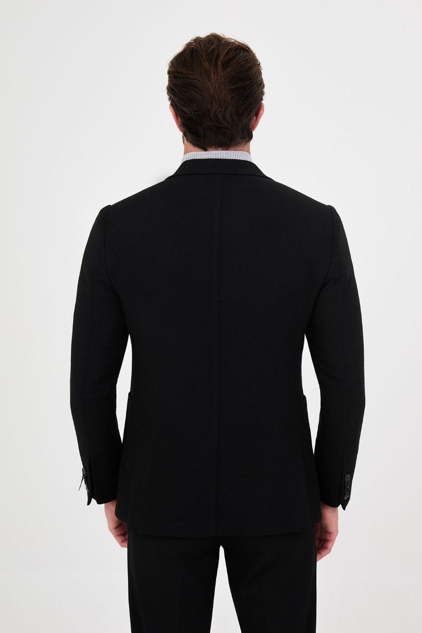 Back view of men’s black blazer