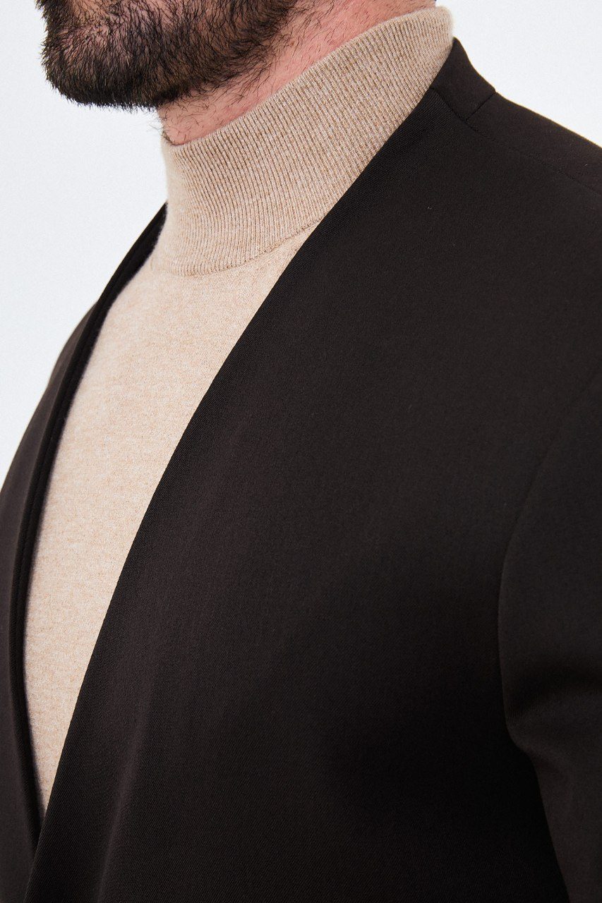 Men's dark brown collarless one-button two-piece suit neckline fabric detail