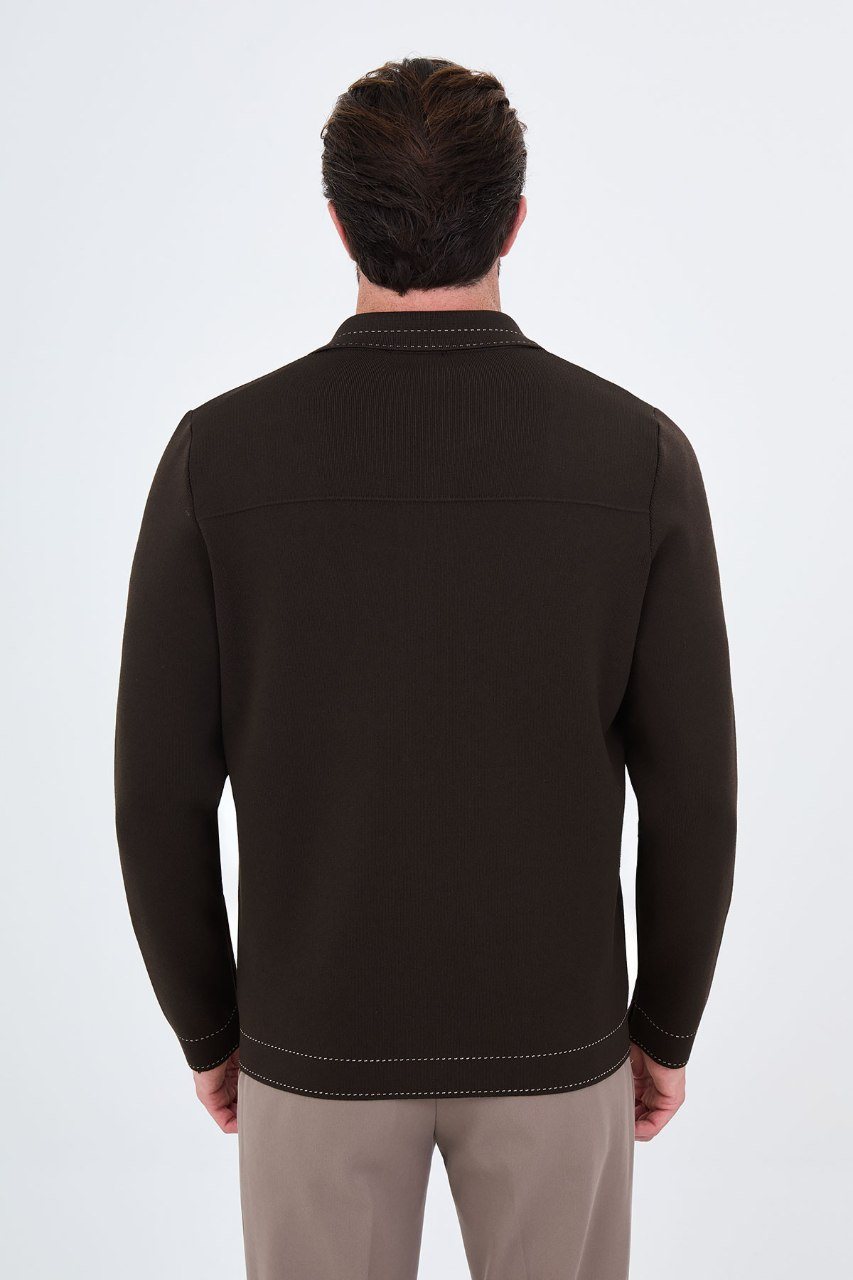 Man wearing a brown button-front cardigan with contrast trim, back view