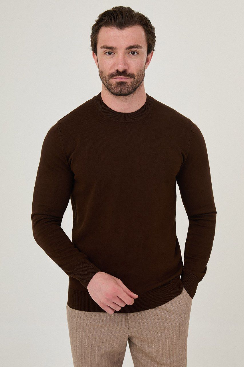 Front view of a man wearing a brown crew neck sweater with long sleeves