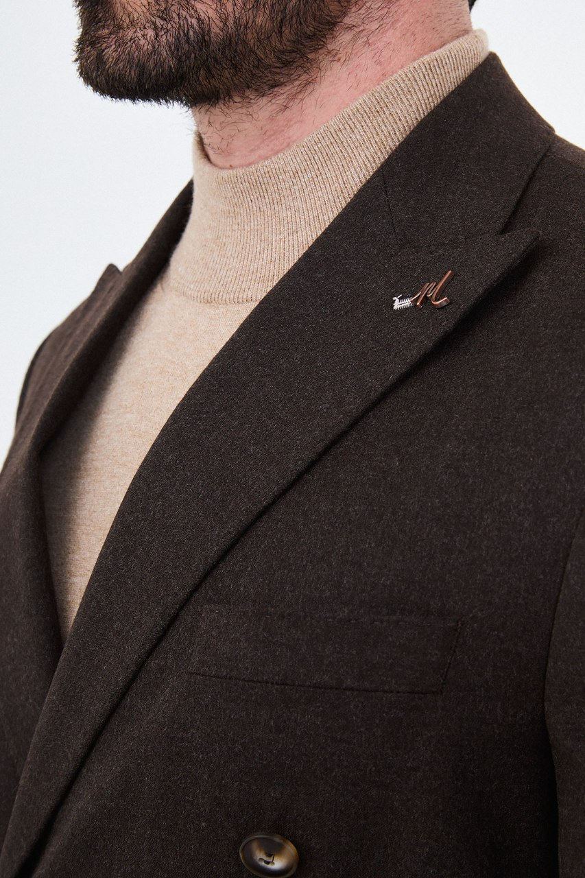 Men's dark brown double-breasted two-piece suit lapel detail