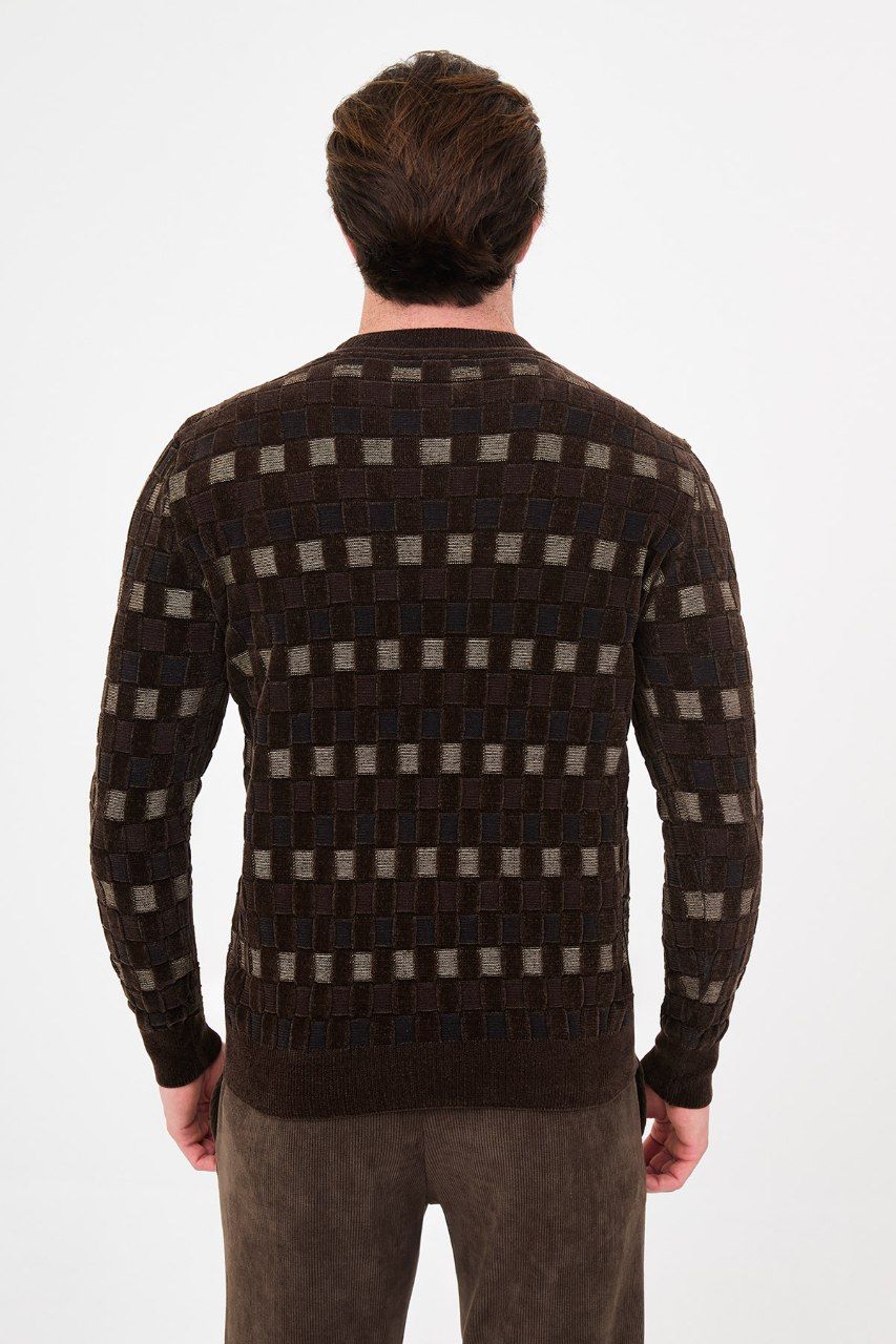 Back view of the men's brown geometric patterned sweater