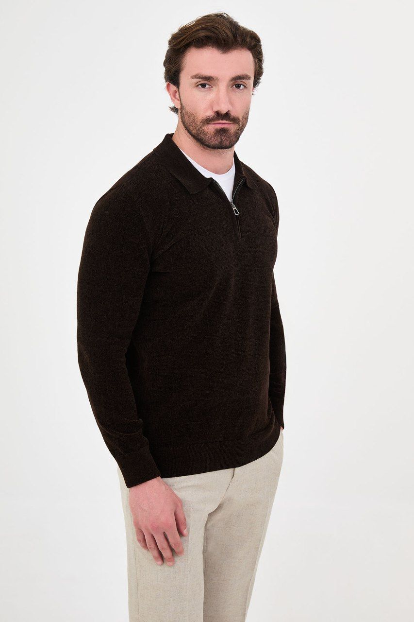 Angled view of a man wearing a brown textured quarter-zip polo sweater