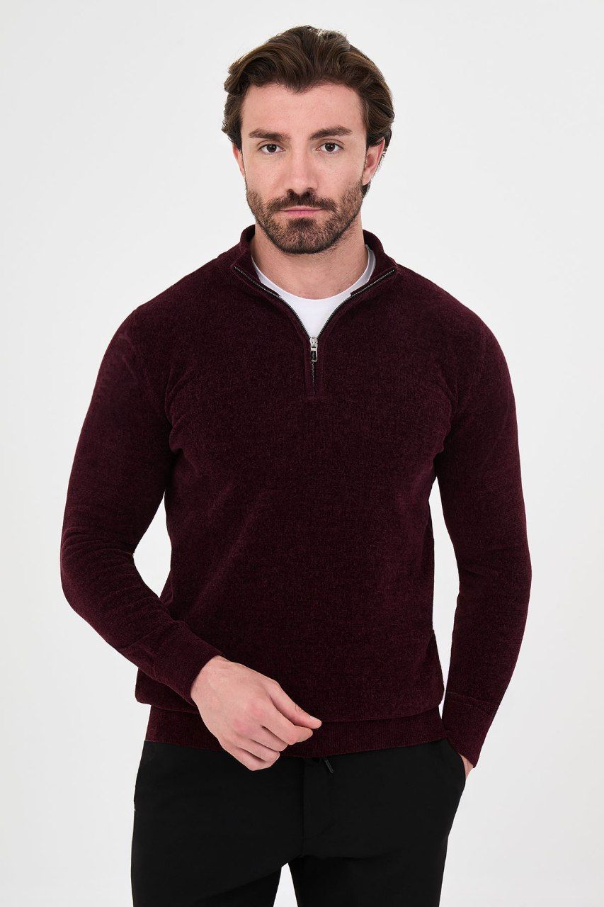 Front view of a man wearing a burgundy textured quarter-zip sweater