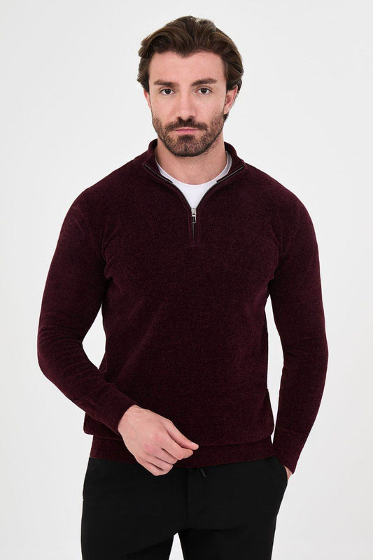 Front view of a man wearing a burgundy textured quarter-zip sweater