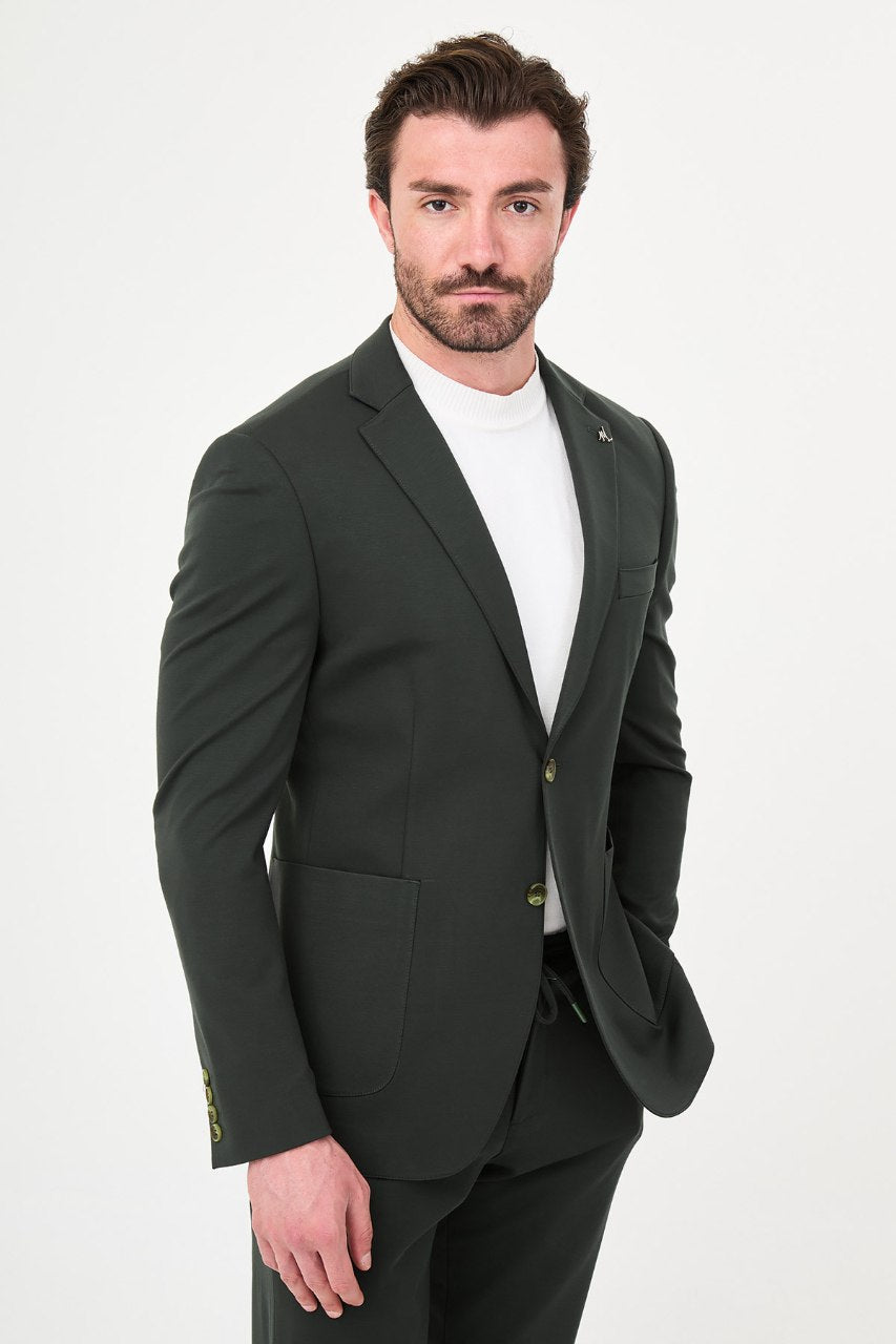Men's dark green two-piece suit side styled view