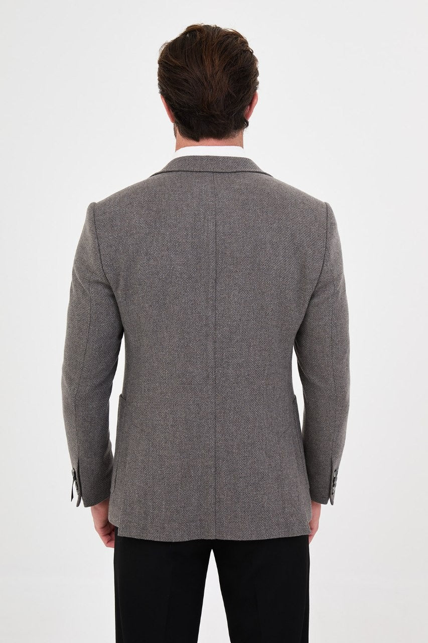 Back view of men’s grey blazer