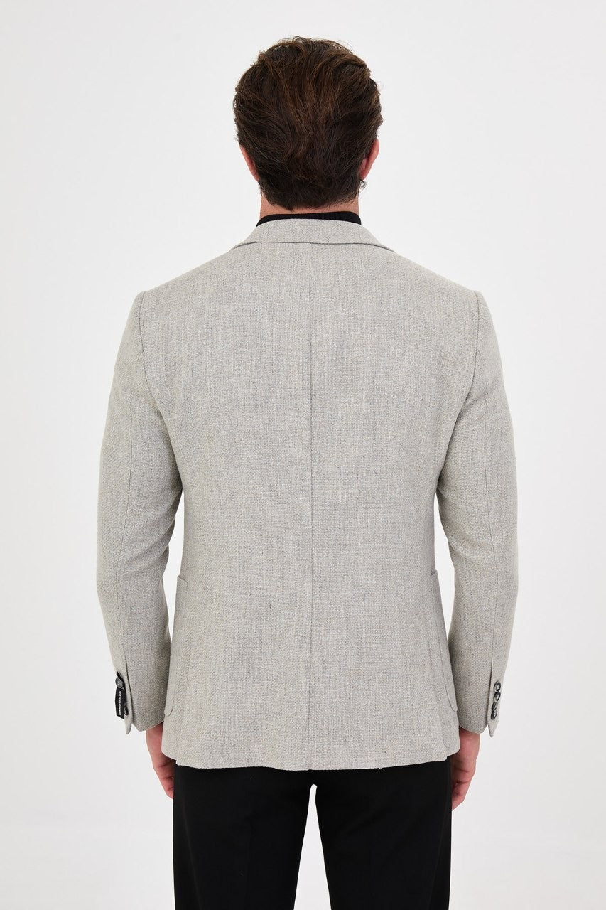 Back view of men’s light grey blazer