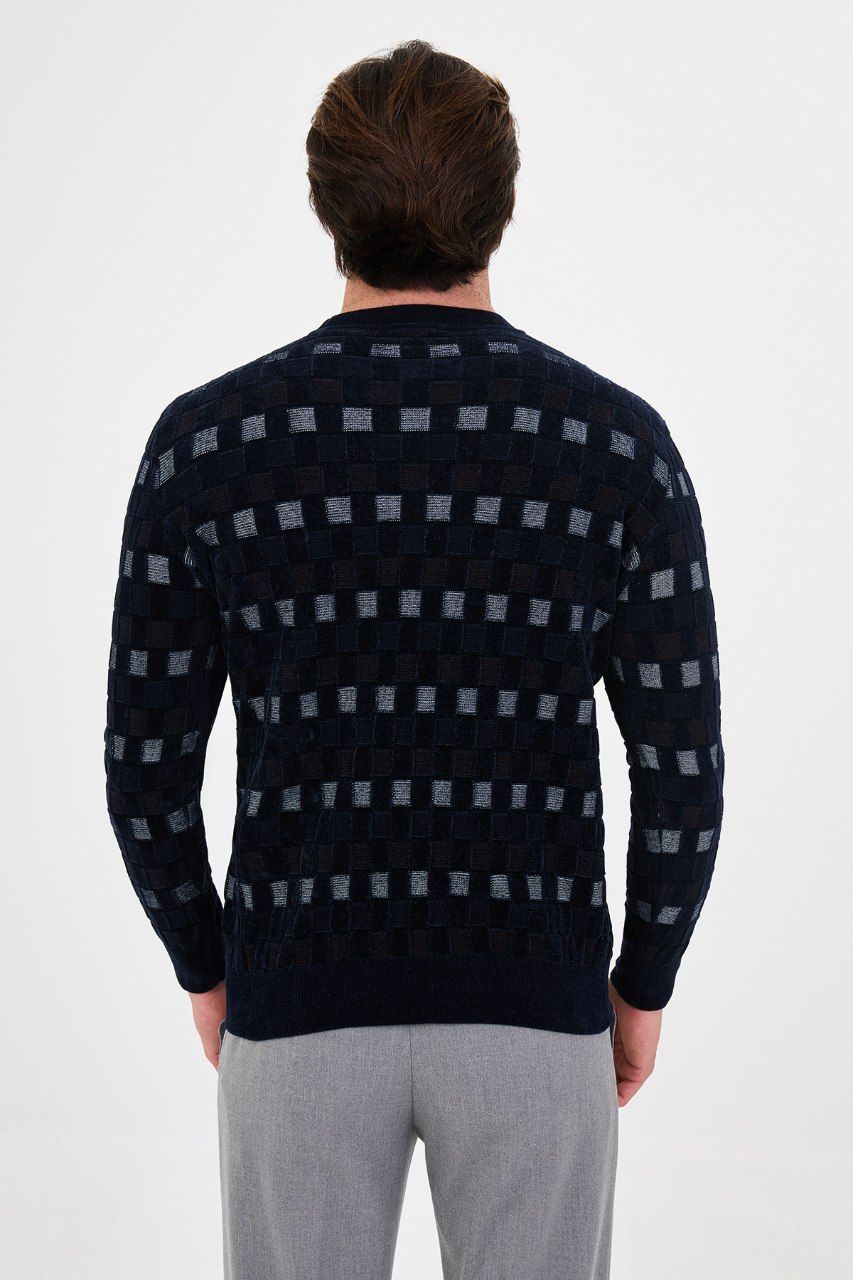 Back view of the men's navy blue geometric patterned sweater