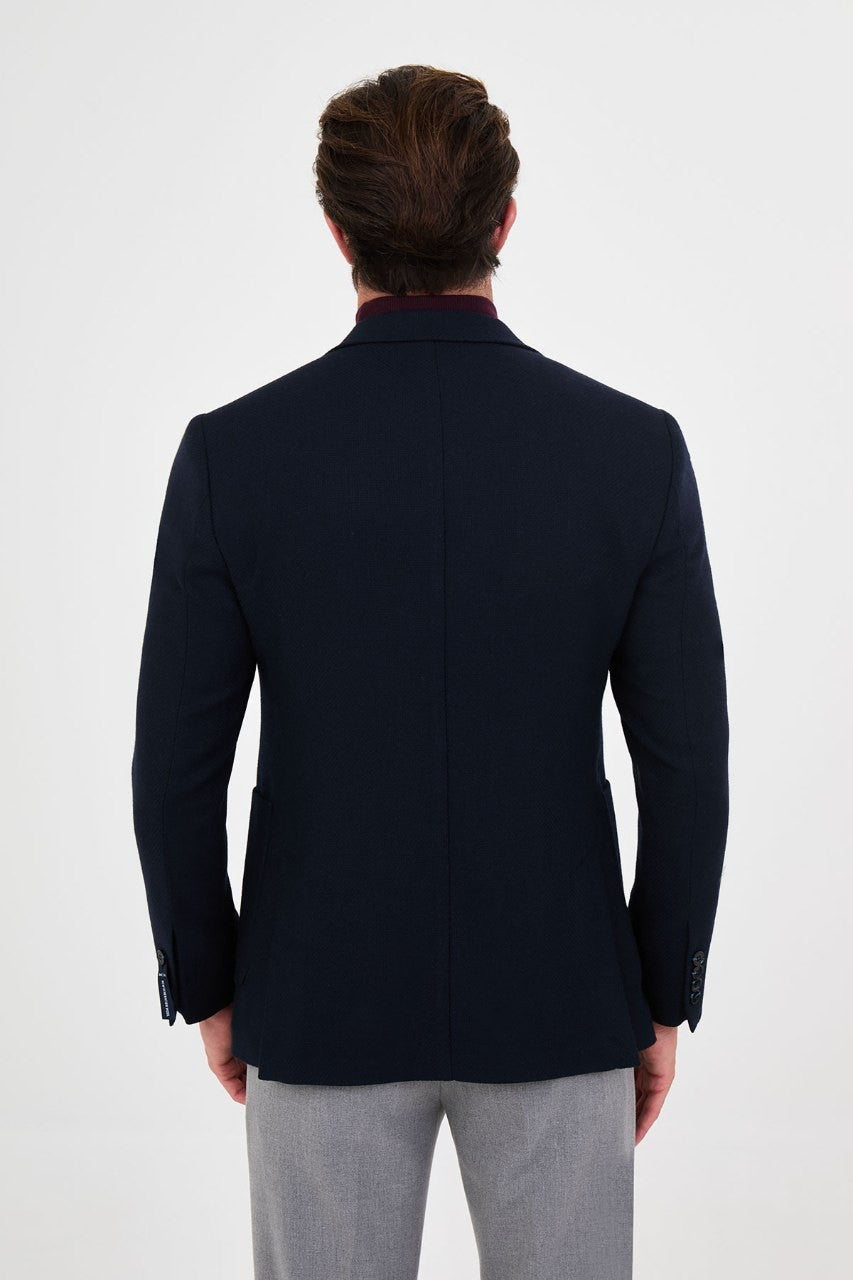Back view of men’s navy blue blazer