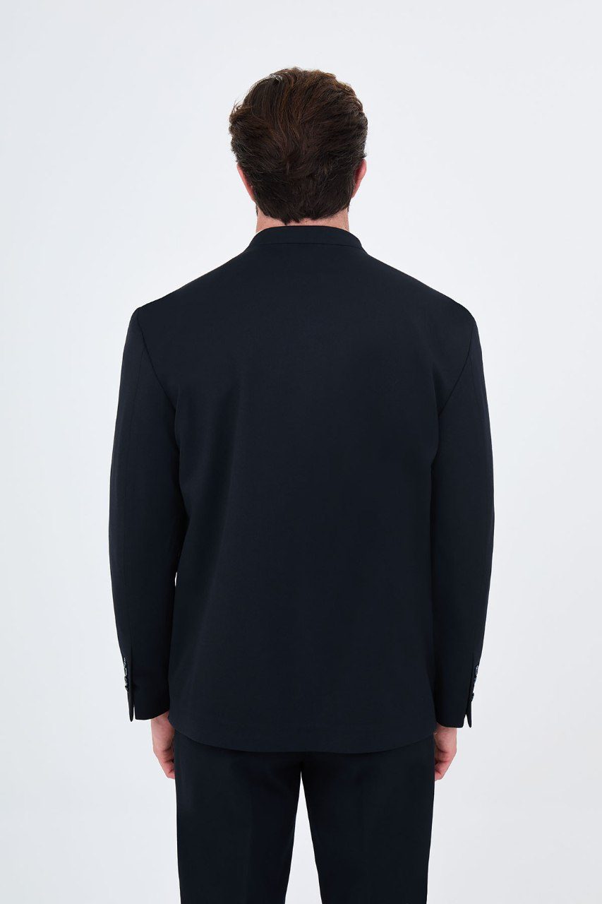 Men's navy blue collarless one-button two-piece suit back view