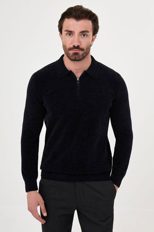 Front view of a man wearing a navy textured quarter-zip polo sweater
