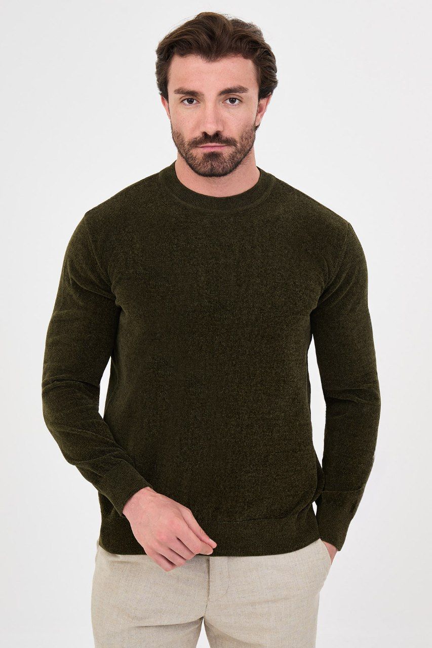 Front view of a man wearing a olive textured crew-neck sweater