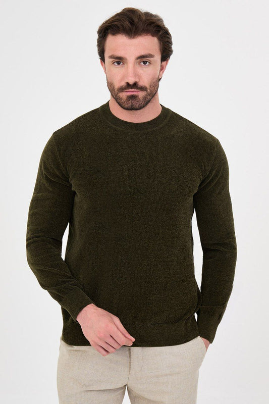 Front view of a man wearing a olive textured crew-neck sweater