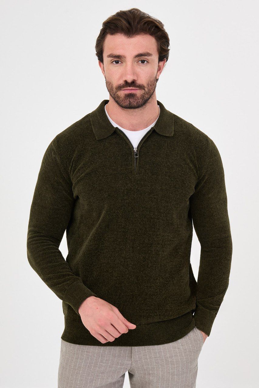 Front view of a man wearing a olive textured quarter-zip polo sweater