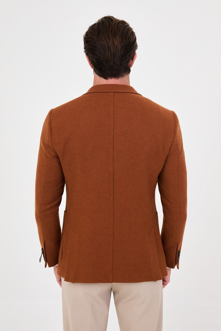 Back view of men’s rust orange blazer