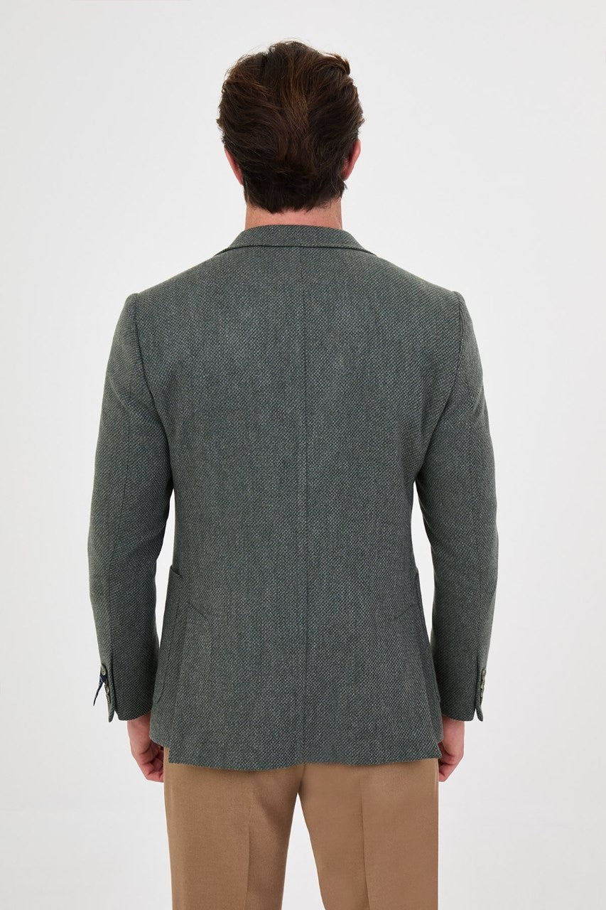 Back view of men’s sage green blazer