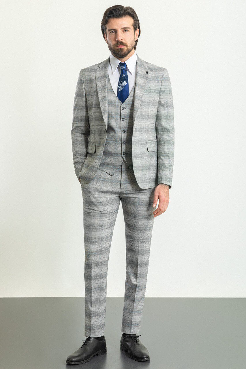 Man wearing a stylish Gray Blue Patterned Suit, perfect for blue gray suit combinations and weddings.