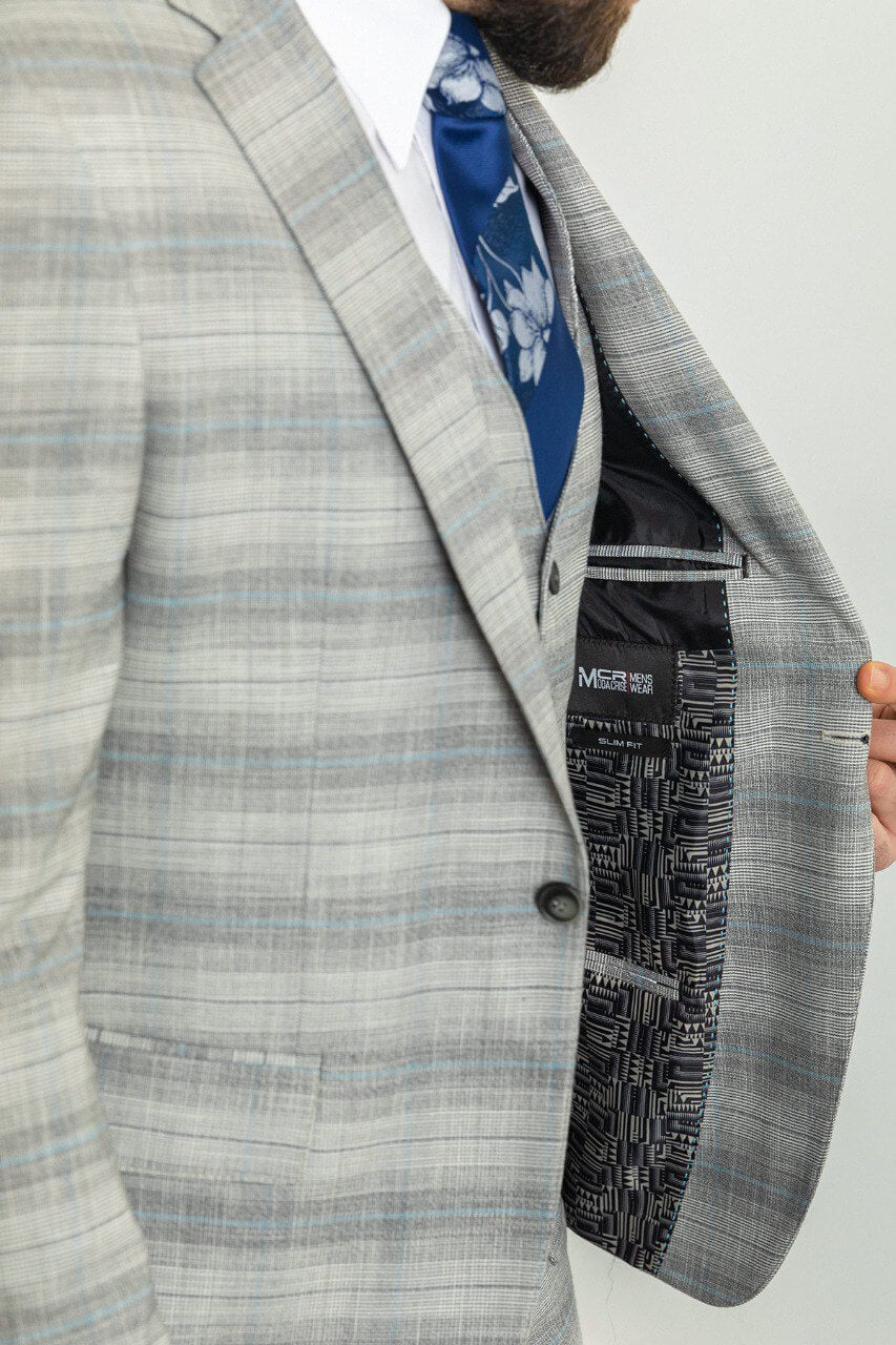 Man wearing a stylish Gray Blue Patterned Suit, perfect for blue gray suit combinations and weddings.