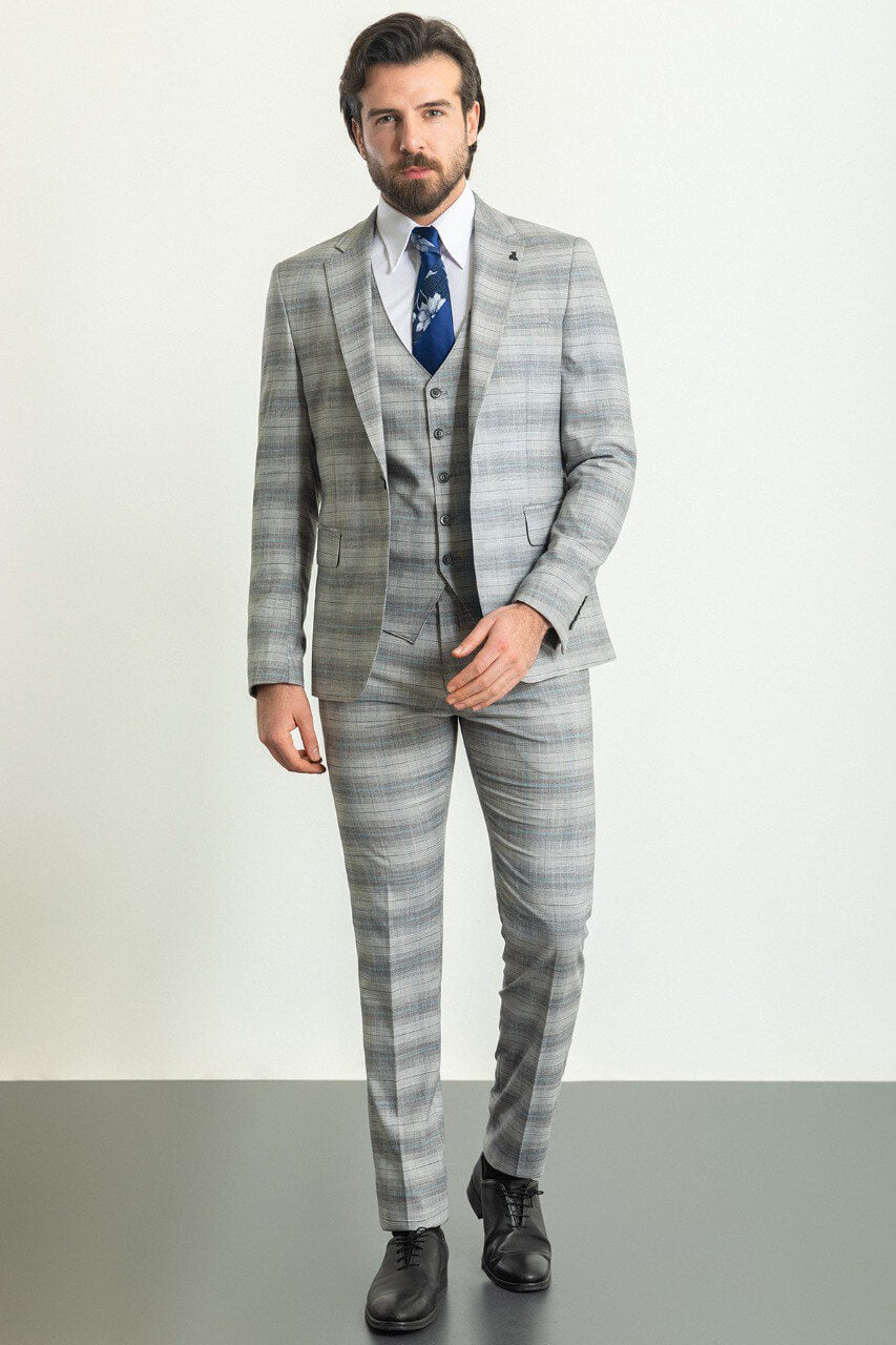 Man wearing a stylish Gray Blue Patterned Suit, perfect for blue gray suit combinations and weddings.