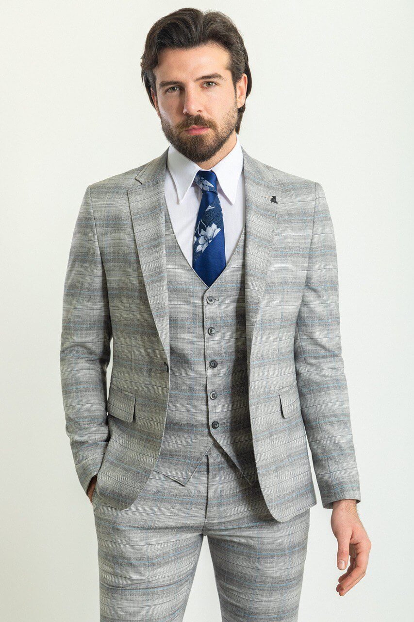 Man wearing a stylish Gray Blue Patterned Suit, perfect for blue gray suit combinations and weddings.