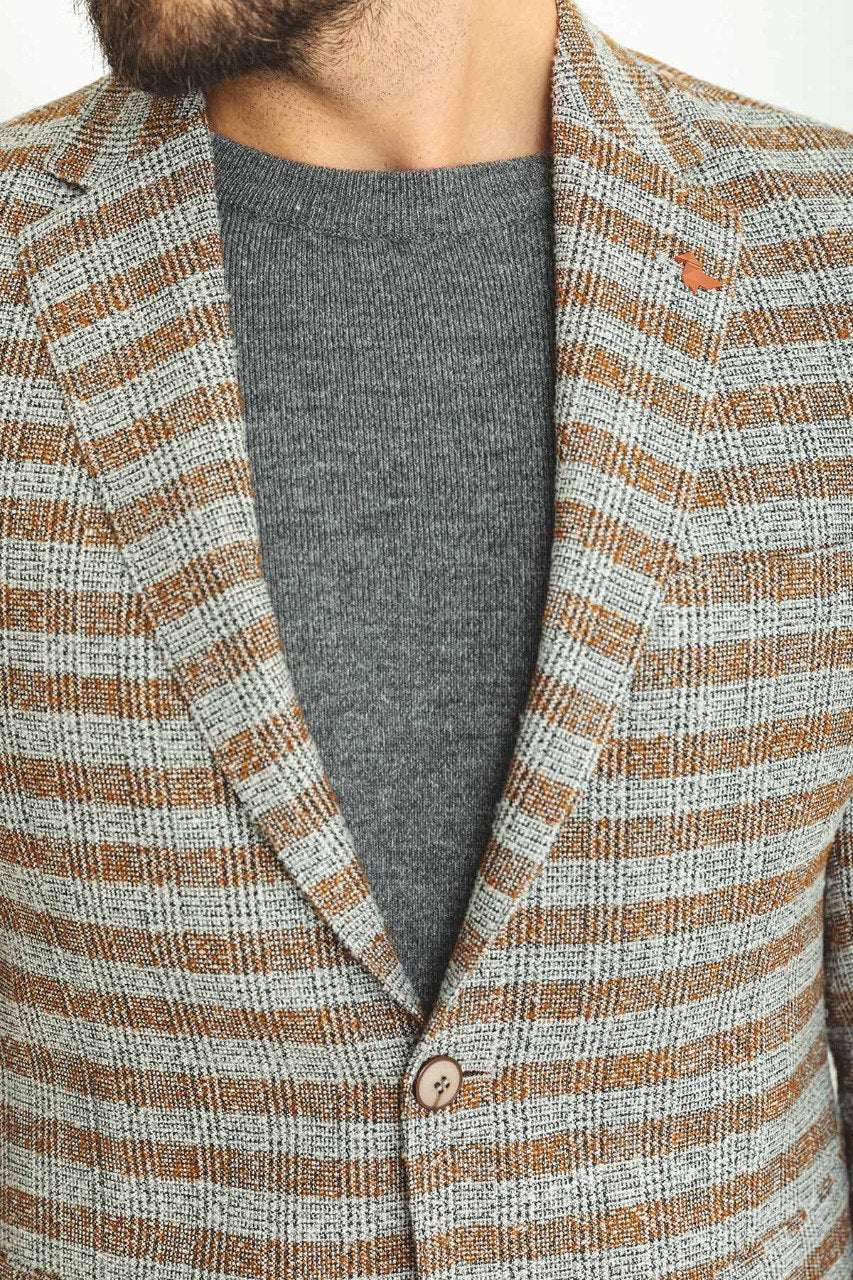 Man wearing a Sepia Glen Plaid Blazer with a pointed collar, flap pockets, and a slim fit, perfect for office meetings and casual outings.