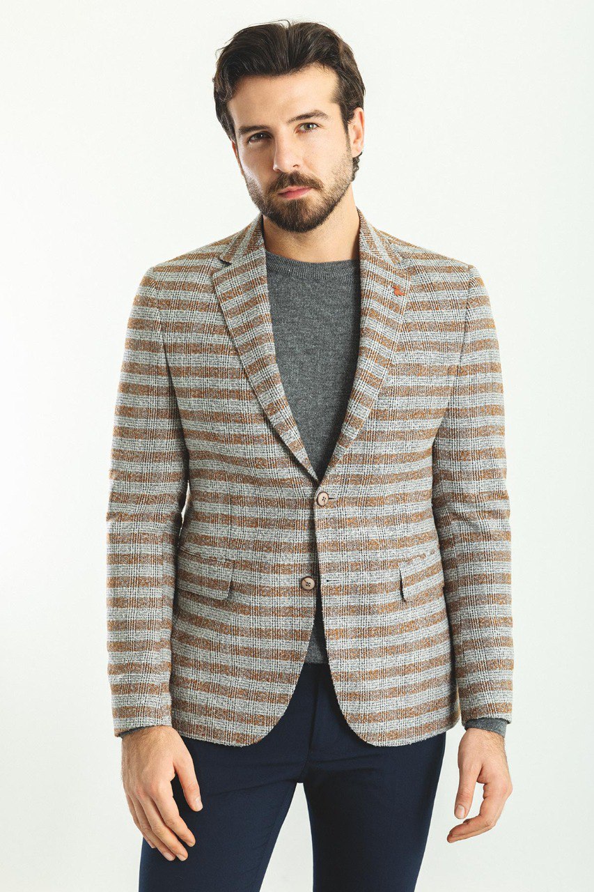 Man wearing a Sepia Glen Plaid Blazer with a pointed collar, flap pockets, and a slim fit, perfect for office meetings and casual outings.