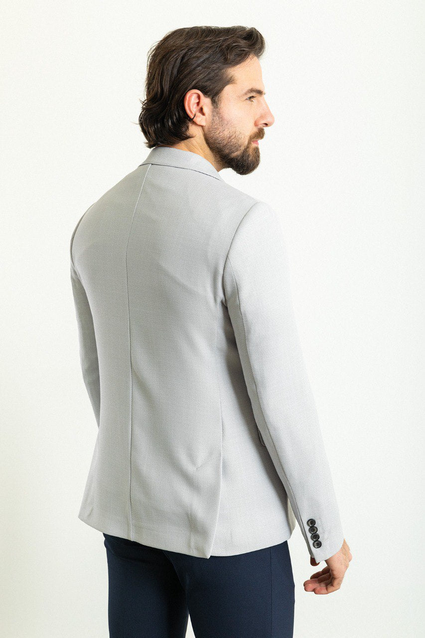 Man wearing a Silver Lining Casual Blazer , perfect for both formal and casual occasions.