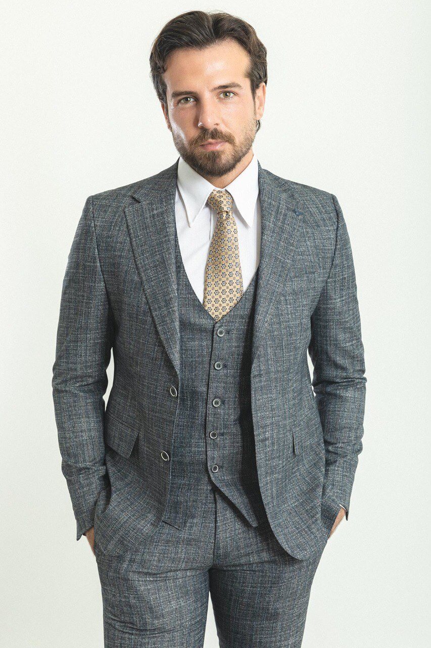 Man in a slim-fit gray 3-piece suit, showcasing elegant men's formalwear.