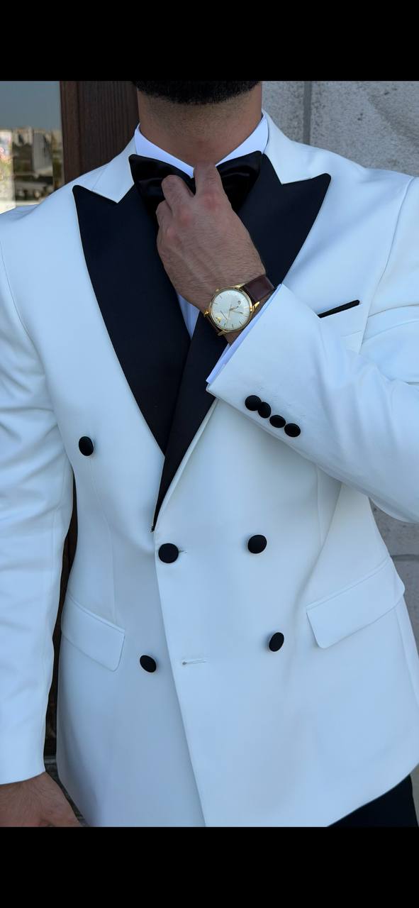 White double-breasted tuxedo black peak lapels and button detail