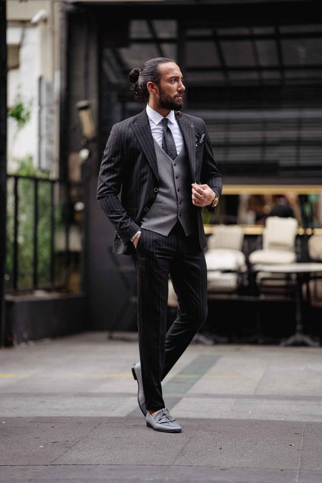A Black Slim Fit Plaid Detailed Suit on display.
